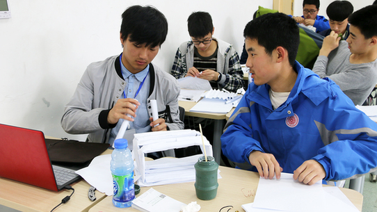 第九届中学生数理化学科能力展示河南区复赛在郑州英迪国际学校举办